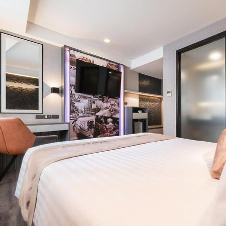 Hotel Aspira Gems Center Silom Bangkok Habitación foto
