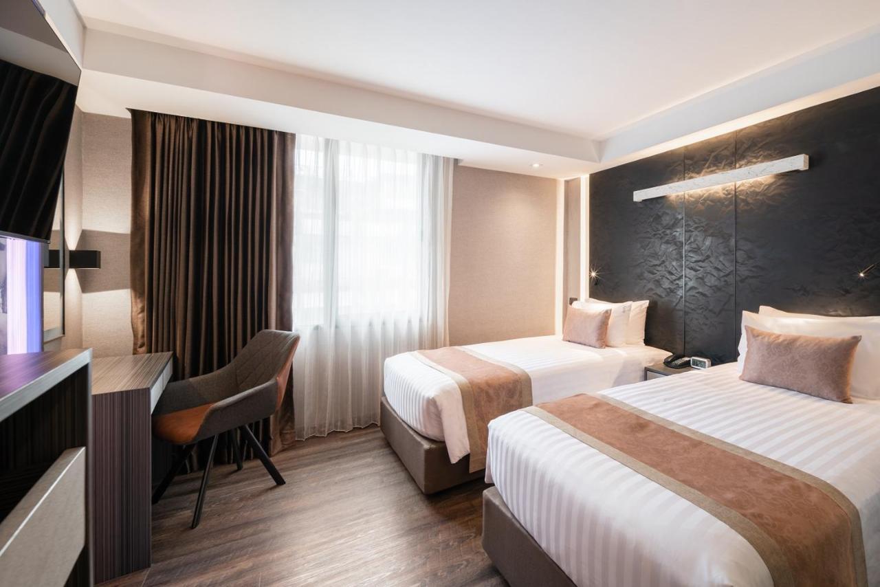 Hotel Aspira Gems Center Silom Bangkok Habitación foto