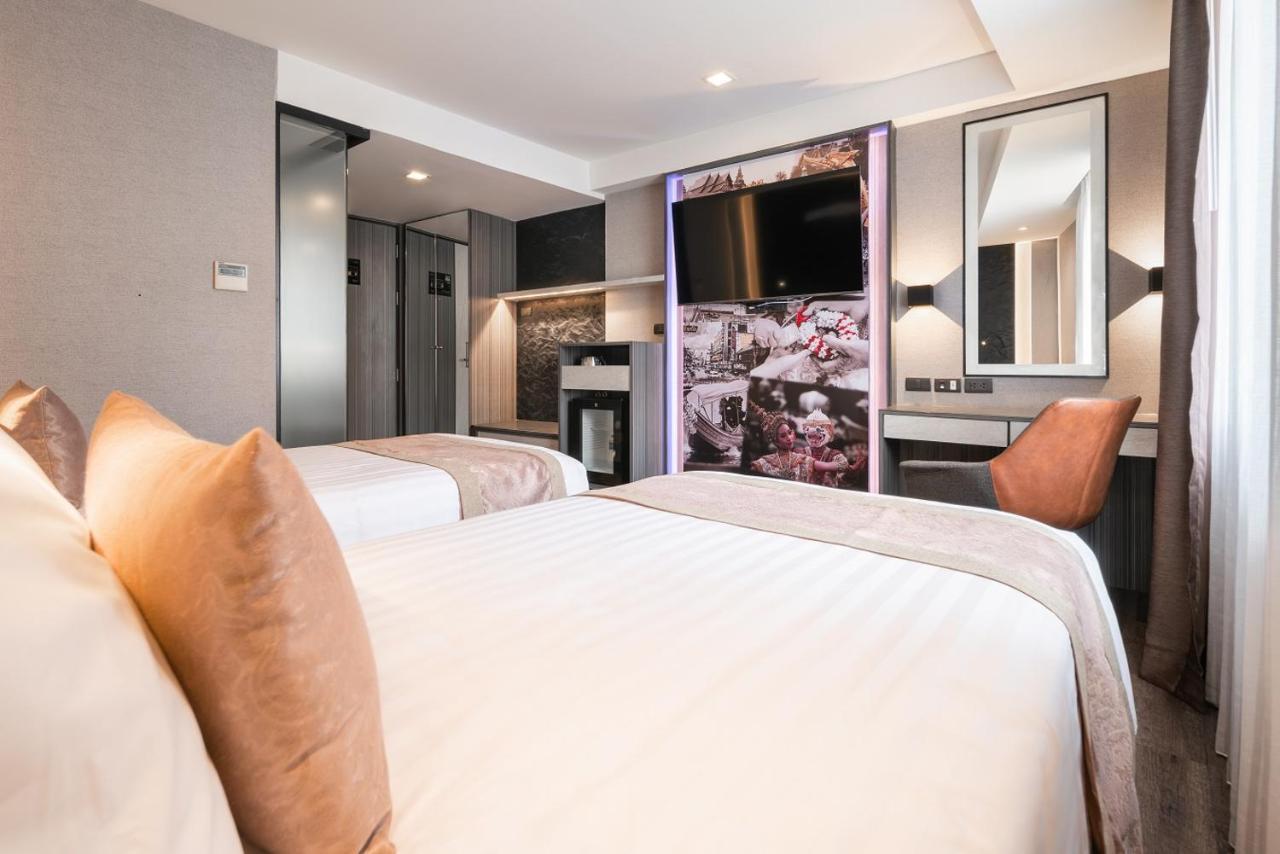 Hotel Aspira Gems Center Silom Bangkok Habitación foto